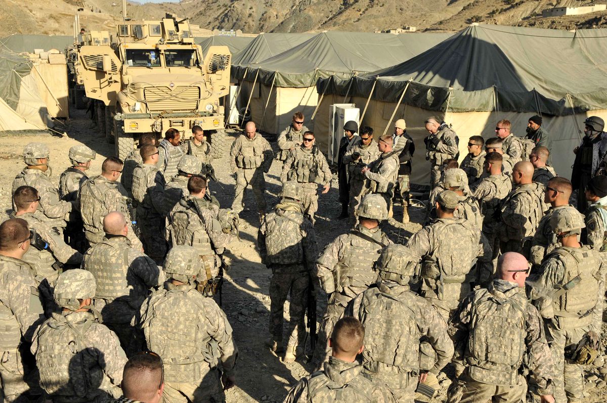 Mathews Metyko leading a pre-mission brief — Operation Enduring Freedom, Afghanistan